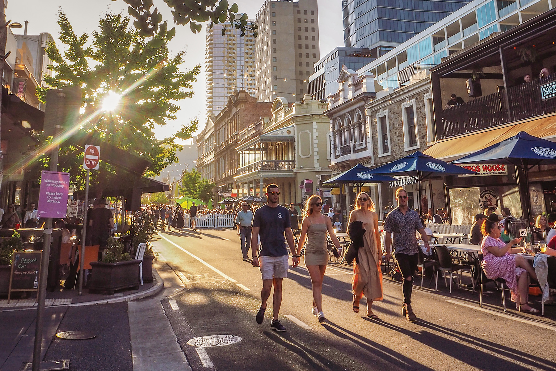 a group of students strolling down Rundle Street of Adelaide